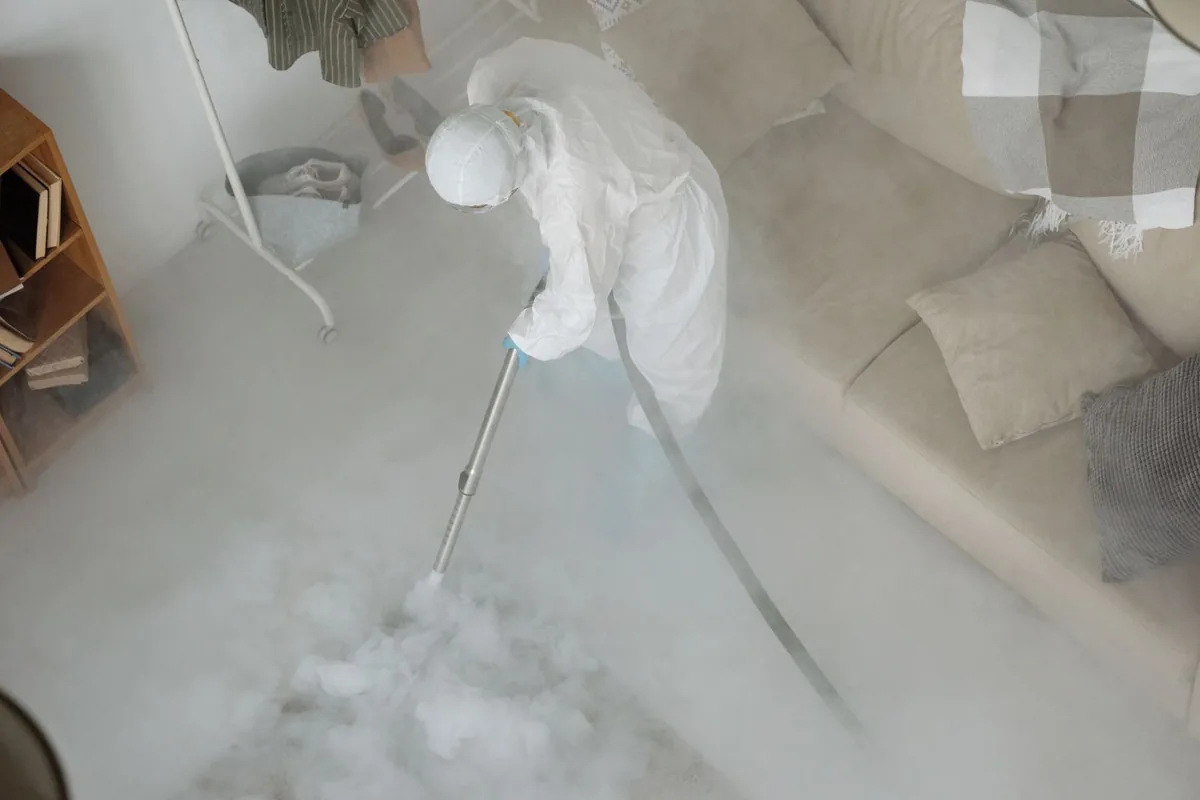 Biohazard cleanup technician in protective equipment, Cowarts, AL